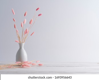 Natural Dried Bunny Tail Grass On White Wooden Plank Floor Vintage Style. Interior Design Concepts.