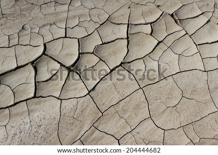 Similar – Foto Bild Gerissene Bodentextur. Harte Schatten und Sonne. Getrockneter Boden.