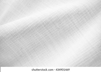 natural fabric linen texture for design. sackcloth textured. White Canvas for Background.. Image has shallow depth of field.
