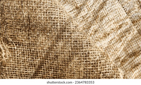 Natural fabric texture, frame and background of burlap. Rough crumpled burlap background. Selective focus - Shutterstock ID 2364783353