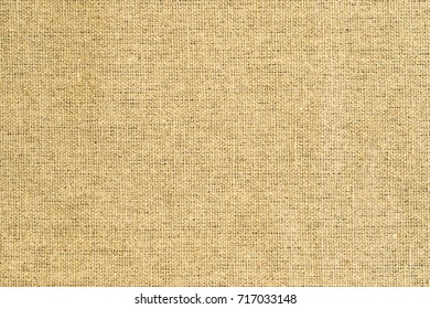 Natural Fabric Of Yellow Brown Sackcloth. Original Material. Background Texture.
