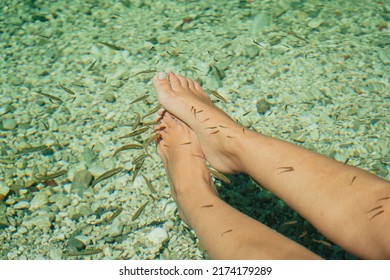 Natural feet spa outdoor in the river, foot pedicure in nature 