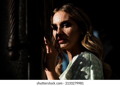 Natural Female Beauty. Young Woman With Clean Fresh Skin. Sensual Portrait Of Elegant Young Woman Outdoors. Woman Face In Shadow.