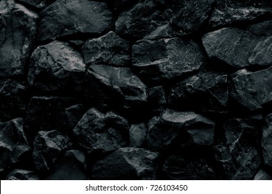 Natural Fire Ashes With Dark Grey Black Coals Texture. It Is A Flammable Black Hard Rock.  Space For Text. 