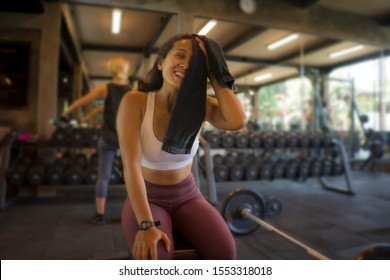 Natural Fitness Club Lifestyle Portrait Of Young Happy And Attractive Asian Woman Training At Gym Bench Wiping The Sweat With Towel Smiling Cheerful And Positive After Hard Bodybuilding Workout