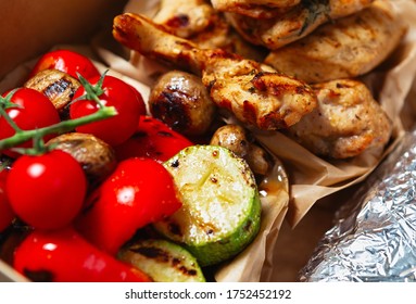 Natural food delivery.Grilled vegetables & chicken meat delivered in cardboard box for healthy lunch
