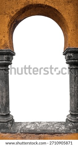 Natural frame in shape of old window with grey stone ancient columns and arch in painted brown wall. Vintage background for design, clipping path