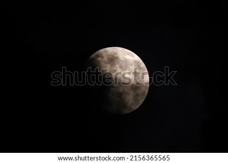 natural full moon at nignt with cloud and with an horror atmospher 