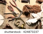 Natural fur tailor made workshop furrier. Workshop furrier, utensils, tools and pieces of natural fur