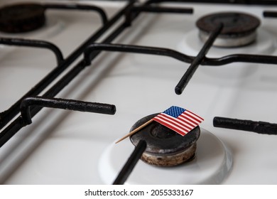 Natural Gas Exports And Imports. High Price. Flag Of The United States Of America On Gas Stove.