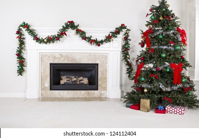 Natural Gas Fireplace With Fully Decorated Christmas Tree In Living Room Of Home During Holidays