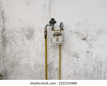 Natural Gas Meter Attached To The Wall Of The House.  Tarakan, Indonesia, November 4, 2022.