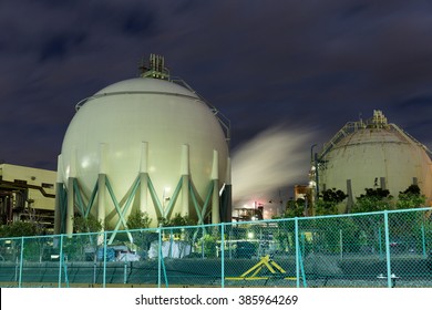 Natural Gas Storage Tanks At Night