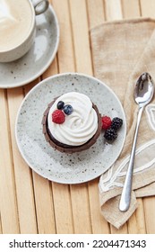 Natural Gluten And Sugar Free Berries Tender Cupcake And Cup Of Coffee. . Cozy Breakfast At The Terrace.