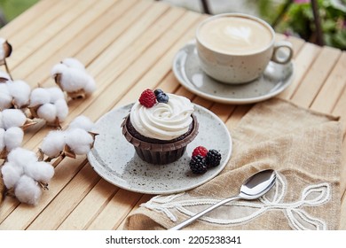 Natural Gluten And Sugar Free Berries Cupcake And Cup Of Coffee. Cotton Decoration. Cozy Lunch At The Terrace.