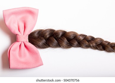 Natural Hair Braided With Pink Ribbon Bow Isolated On White Background