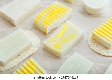 Natural handmade soap bars. Handicraft fragrant yellow soap bars for spa treatments pattern on marble table. Toiletries and Bath cosmetic product for hygiene skincare. - Powered by Shutterstock