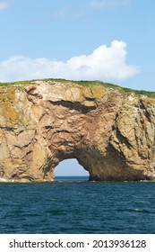 Roché Percé, A Natural Hole In A Huge Rock In The Ocean