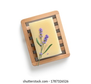 Natural Homemade Lavender Soap With Lavender Flowers On Wooden Soap Dish On White Background. Top View. Flat Lay