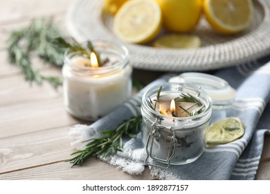 Natural Homemade Mosquito Repellent Candle And Ingredients On Wooden Table. Space For Text