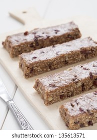 Natural Homemade Protein Bars With Peanut Butter, Honey, Oats, Nuts And Cranberries.