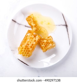 Natural Honey Comb On The Plate.selective Focus.Top View. 