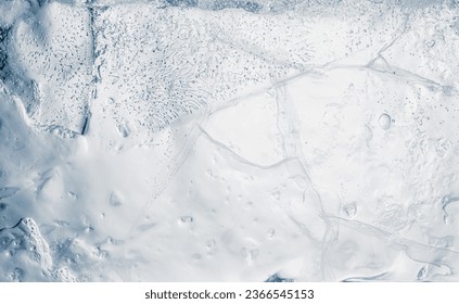 Natural ice texture background with cracks and air bubbles. - Powered by Shutterstock