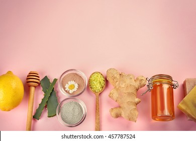 Natural ingredients for skin care on pink background