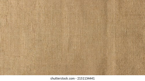 Natural jute burlap texture. Material woven from jute thread. - Shutterstock ID 2151134441
