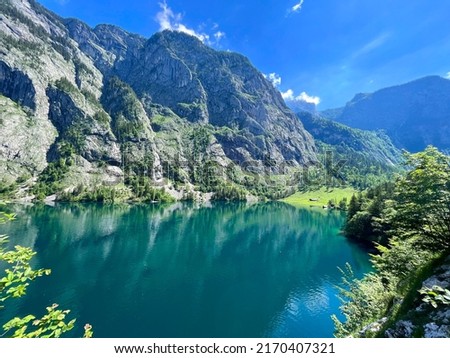 The Königssee is a natural lake in the Berchtesgaden National Park, which is near the Austrian border. It’s noted for its clear water and is advertised as the cleanest lake in Germany.