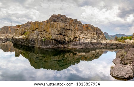 Similar – Foto Bild Strand mit Felsen und Pfütze im Sonnenuntergang, Ribadeo, Lugo, Galizien, Spanien