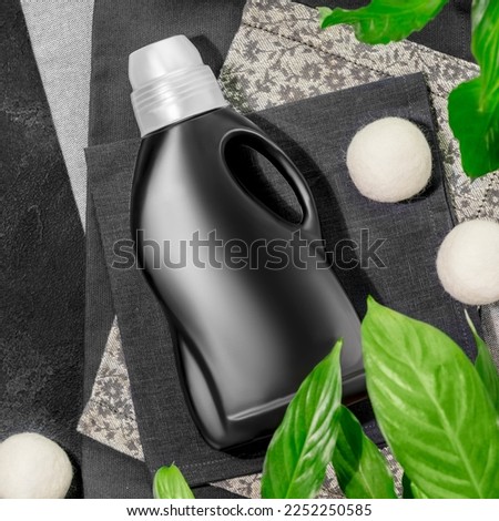 Image, Stock Photo Fabric softener | black and yellow laundry wafting fragrant in alleyway