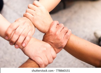 Natural lighting and shadow of Ring of Hands Meaning to Success Teamwork or Together on Blurred street Background with copy space. Teamwork concept. - Shutterstock ID 778860151