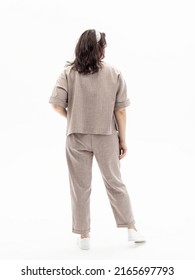 Natural Linen Pantsuit On White Background. Women's Summer Trousers. Back View. Large Size