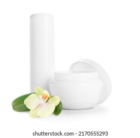 Natural lip balms and orchid flower on white background