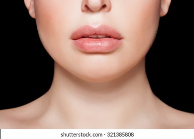 Natural Lips. Close Up Shoot In Studio On Black