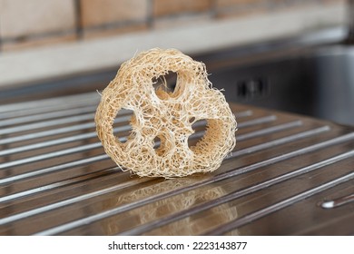 Natural Loofah Sponge On Steel Sink