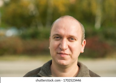 Natural Looking Guy With Blue Eyes Smiling, Portrait 