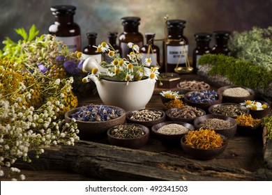 Natural Medicine On Wooden Table Background