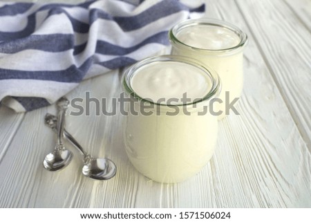 Similar – Image, Stock Photo glass jars with homemade yogurt