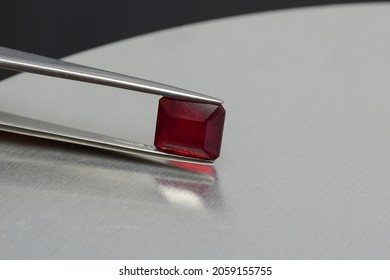 Natural Mined Heated Lead Glass Filled Treated Emerald Cut Square Faceted Red Ruby Corundum Loose Semitransparent Gemstone Setting For Jewelry Making. Micro Cracks On Gemstone Surface, Bubbles Insde.