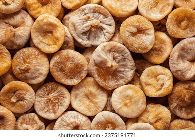 Natural organic dried figs fruit. Whole sun dried figs as a background. - Powered by Shutterstock