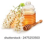 Natural organic honey in glass jar, honey plant acacia flowers and leaves near it isolated on white background.