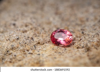 Natural Padparadscha Sapphire Gemstone from Madagascar, 0.94 carats, Rare Orangish Pink Color  - Shutterstock ID 1883691592
