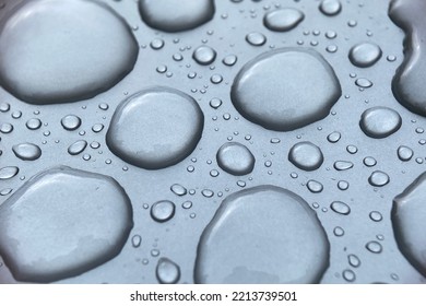 Natural Pattern Of Raindrops Isolated On A Gray Background.
