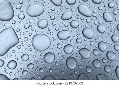 Natural Pattern Of Raindrops Isolated On A Gray Background.
