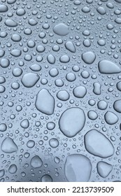 Natural Pattern Of Raindrops Isolated On A Gray Background.
