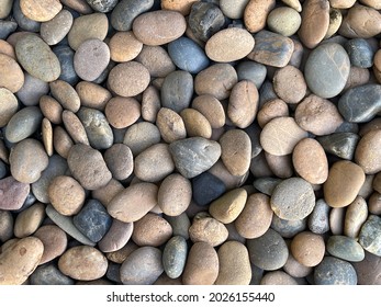 Natural pebbles rocks, Stone for garden decorations. River Stone Background and texture