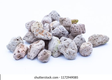A natural piece of pumice stone isolated on white background. - Shutterstock ID 1172949085