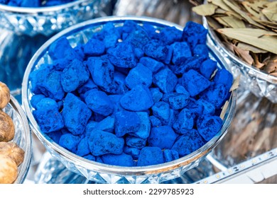 Natural pieces of indigo sold in a middle-eastern souk market stall in Dubai.